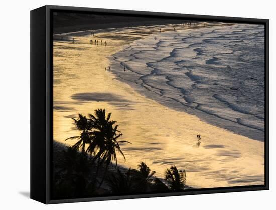 Icapui Beach, with People Fishing and Playing at Sunset-Alex Saberi-Framed Stretched Canvas