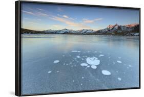 Ice Bubbles on the Frozen Surface of Andossi Lake at Sunrise, Spluga Valley, Valtellina, Italy-Roberto Moiola-Framed Photographic Print