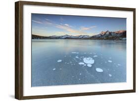 Ice Bubbles on the Frozen Surface of Andossi Lake at Sunrise, Spluga Valley, Valtellina, Italy-Roberto Moiola-Framed Photographic Print