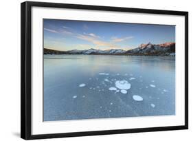 Ice Bubbles on the Frozen Surface of Andossi Lake at Sunrise, Spluga Valley, Valtellina, Italy-Roberto Moiola-Framed Photographic Print