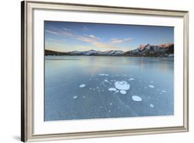 Ice Bubbles on the Frozen Surface of Andossi Lake at Sunrise, Spluga Valley, Valtellina, Italy-Roberto Moiola-Framed Photographic Print