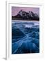 Ice cracks along Abraham Lake in Banff, Canada with purple clouds and scenic mountains-David Chang-Framed Photographic Print