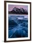 Ice cracks along Abraham Lake in Banff, Canada with purple clouds and scenic mountains-David Chang-Framed Photographic Print