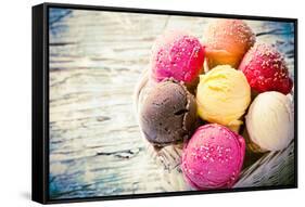 Ice Cream Scoops on Wooden Table, Close-Up.-Kesu01-Framed Stretched Canvas