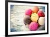 Ice Cream Scoops on Wooden Table, Close-Up.-Kesu01-Framed Photographic Print