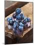 Ice Cubes with Blueberries on a Wooden Table-Chris Schäfer-Mounted Photographic Print