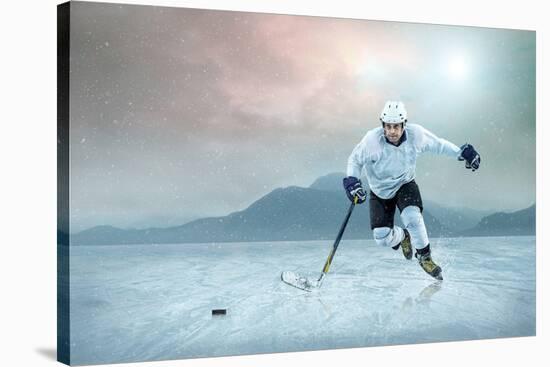 Ice Hockey Player on the Ice, Outdoor.-Andrey Yurlov-Stretched Canvas