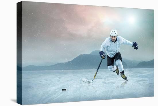 Ice Hockey Player on the Ice, Outdoor.-Andrey Yurlov-Stretched Canvas