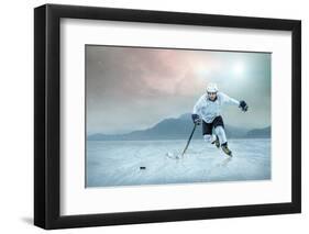 Ice Hockey Player on the Ice, Outdoor.-Andrey Yurlov-Framed Photographic Print