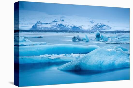 Ice in the glacial lagoon at Jokulsarlon, Iceland-David Noton-Stretched Canvas