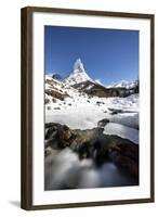 Ice on rocks frames granitic snowy peak of Stetind mountain under starry sky, Tysfjord, Norway-Roberto Moiola-Framed Photographic Print