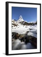 Ice on rocks frames granitic snowy peak of Stetind mountain under starry sky, Tysfjord, Norway-Roberto Moiola-Framed Photographic Print