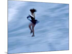 Ice Skater in a Spin-null-Mounted Photographic Print