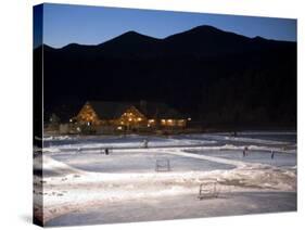 Ice Skating and Hockey on Evergreen Lake, Colorado, USA-Chuck Haney-Stretched Canvas