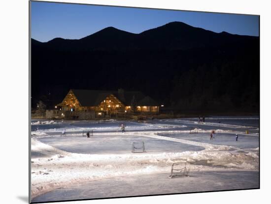 Ice Skating and Hockey on Evergreen Lake, Colorado, USA-Chuck Haney-Mounted Photographic Print