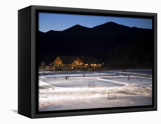 Ice Skating and Hockey on Evergreen Lake, Colorado, USA-Chuck Haney-Framed Stretched Canvas