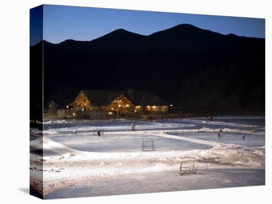 Ice Skating and Hockey on Evergreen Lake, Colorado, USA-Chuck Haney-Stretched Canvas