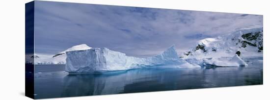 Iceberg Floating on the Water, Paradise Bay, Antarctica-null-Stretched Canvas