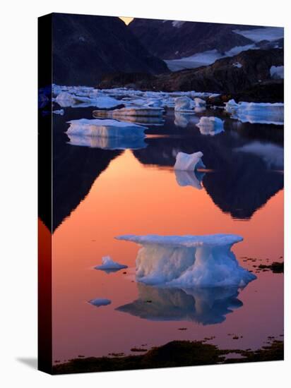 Iceberg Floats in the Bay in Kulusuk, Greenland Near the Arctic Circle-null-Stretched Canvas