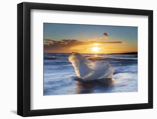 Iceberg from melting glacier on black sand beach near Jokulsarlon glacier lagoon-Ed Hasler-Framed Photographic Print