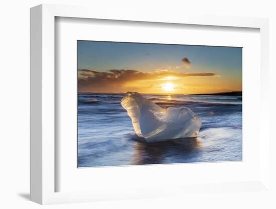 Iceberg from melting glacier on black sand beach near Jokulsarlon glacier lagoon-Ed Hasler-Framed Photographic Print