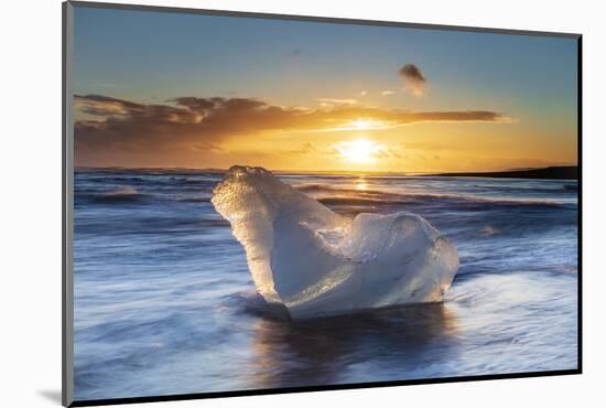 Iceberg from melting glacier on black sand beach near Jokulsarlon glacier lagoon-Ed Hasler-Mounted Photographic Print