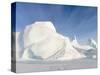 Iceberg frozen into the sea ice of the Melville Bay, near Kullorsuaq in the far north-Martin Zwick-Stretched Canvas