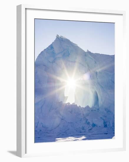 Iceberg frozen into the sea ice of the Uummannaq fjord system during winter. Greenland-Martin Zwick-Framed Photographic Print