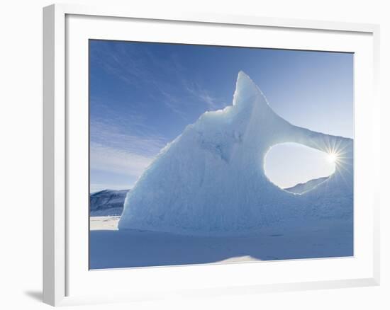 Iceberg frozen into the sea ice of the Uummannaq fjord system during winter. Greenland-Martin Zwick-Framed Photographic Print