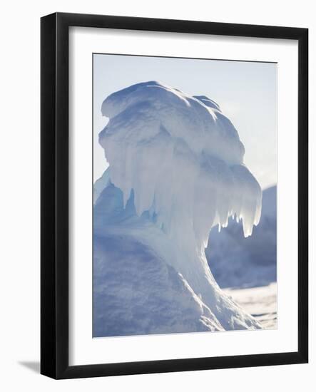 Iceberg frozen into the sea ice of the Uummannaq fjord system during winter. Greenland-Martin Zwick-Framed Photographic Print