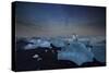 Iceberg on Black Sand Beach with Dramatic Sky-Alex Saberi-Stretched Canvas