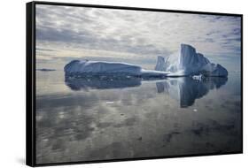 Iceberg reflected in still water of the Crystal Sound, Antarctic Peninsula, Antarctica-Michel Roggo-Framed Stretched Canvas
