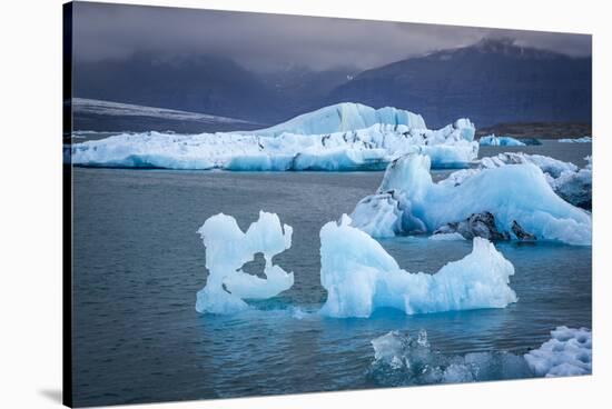 Icebergs Floating in the Glacier Lagoon Beneath Breidamerkurjokull Glacier, Jokulsarlon-Andrew Sproule-Stretched Canvas