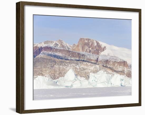 Icebergs frozen into the sea ice of the Uummannaq fjord system during winter. Greenland-Martin Zwick-Framed Photographic Print