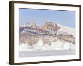 Icebergs frozen into the sea ice of the Uummannaq fjord system during winter. Greenland-Martin Zwick-Framed Photographic Print