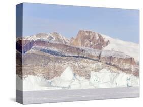 Icebergs frozen into the sea ice of the Uummannaq fjord system during winter. Greenland-Martin Zwick-Stretched Canvas