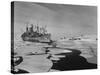 Icebreaker in Frozen Sea Near Base on Antarctica-null-Stretched Canvas