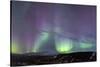 Iceland, Akureyri. Northern Lights glowing.-Ellen Goff-Stretched Canvas