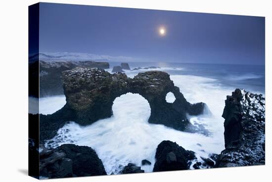 Iceland, Characteristic Cliff Overlooking the Sea, Illuminated by the Moonlight-Alessandro Carboni-Stretched Canvas