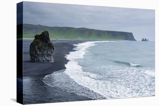 Iceland. Dyrholaey. Black Sand Beach and Sea Stack-Inger Hogstrom-Stretched Canvas