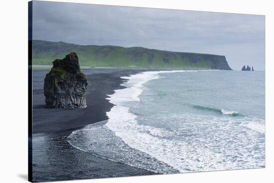 Iceland. Dyrholaey. Black Sand Beach and Sea Stack-Inger Hogstrom-Stretched Canvas