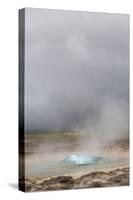 Iceland, Golden Circle. The Strokkur Geyser erupts with much steam.-Ellen Goff-Stretched Canvas