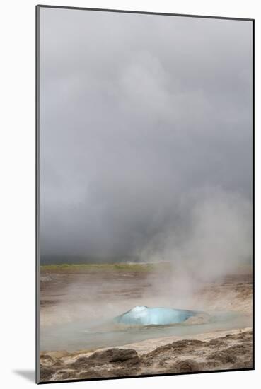 Iceland, Golden Circle. The Strokkur Geyser erupts with much steam.-Ellen Goff-Mounted Photographic Print