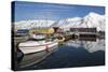 Iceland, Siglufjordur. Boats moored at pier.-Bill Young-Stretched Canvas