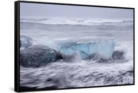 Iceland, Skaftafell National Park, Surf hits glacial ice on a black sand beach.-Ellen Goff-Framed Stretched Canvas