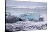 Iceland, Skaftafell National Park, Surf hits glacial ice on a black sand beach.-Ellen Goff-Stretched Canvas