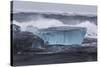 Iceland, Skaftafell National Park, Surf hits glacial ice on a black sand beach.-Ellen Goff-Stretched Canvas