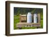 Iceland. Skogafoss. Milk Pails Wait for Pickup Along the Ring Road-Inger Hogstrom-Framed Photographic Print