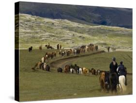 Icelandic Horses and Riders, Riding Near Landmannalaugar, Iceland-Inaki Relanzon-Stretched Canvas