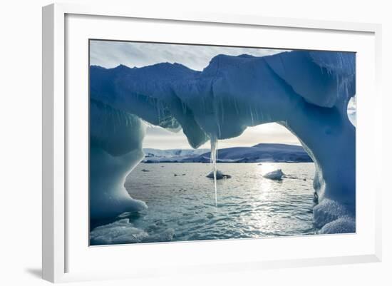 Icicles hang from an iceberg floating by Enterprise Island, Antarctica-Paul Souders-Framed Photographic Print